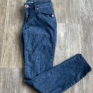 Guess patterned skinny jeans